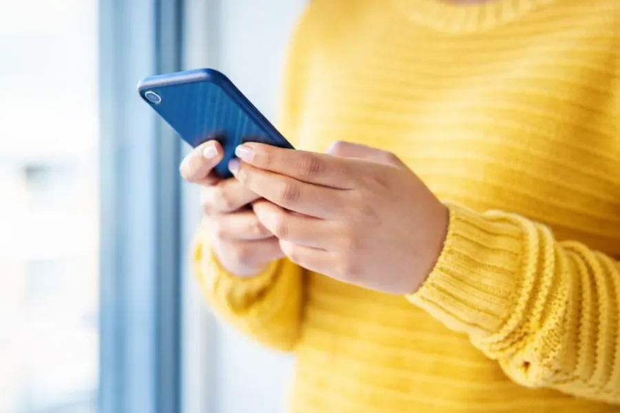 Person looking at missed call on phone